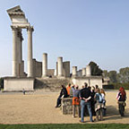 Group of visitors at the reconstructed harbour temple.