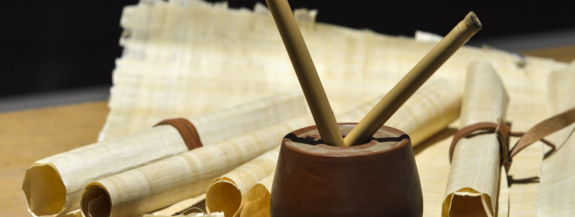 Papyrus scrolls and inkwell in the craftsman's house