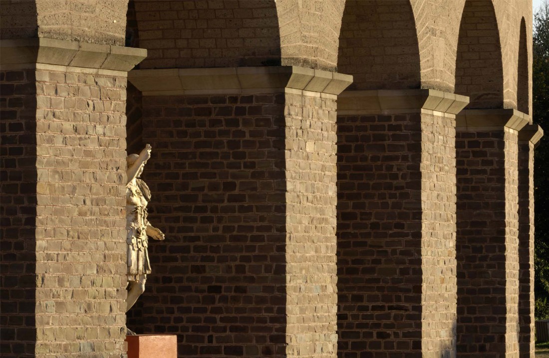 Statue of Trajan in the archway of the arena